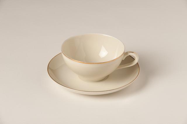 Ivory With Gold Band Cup And Saucer - China